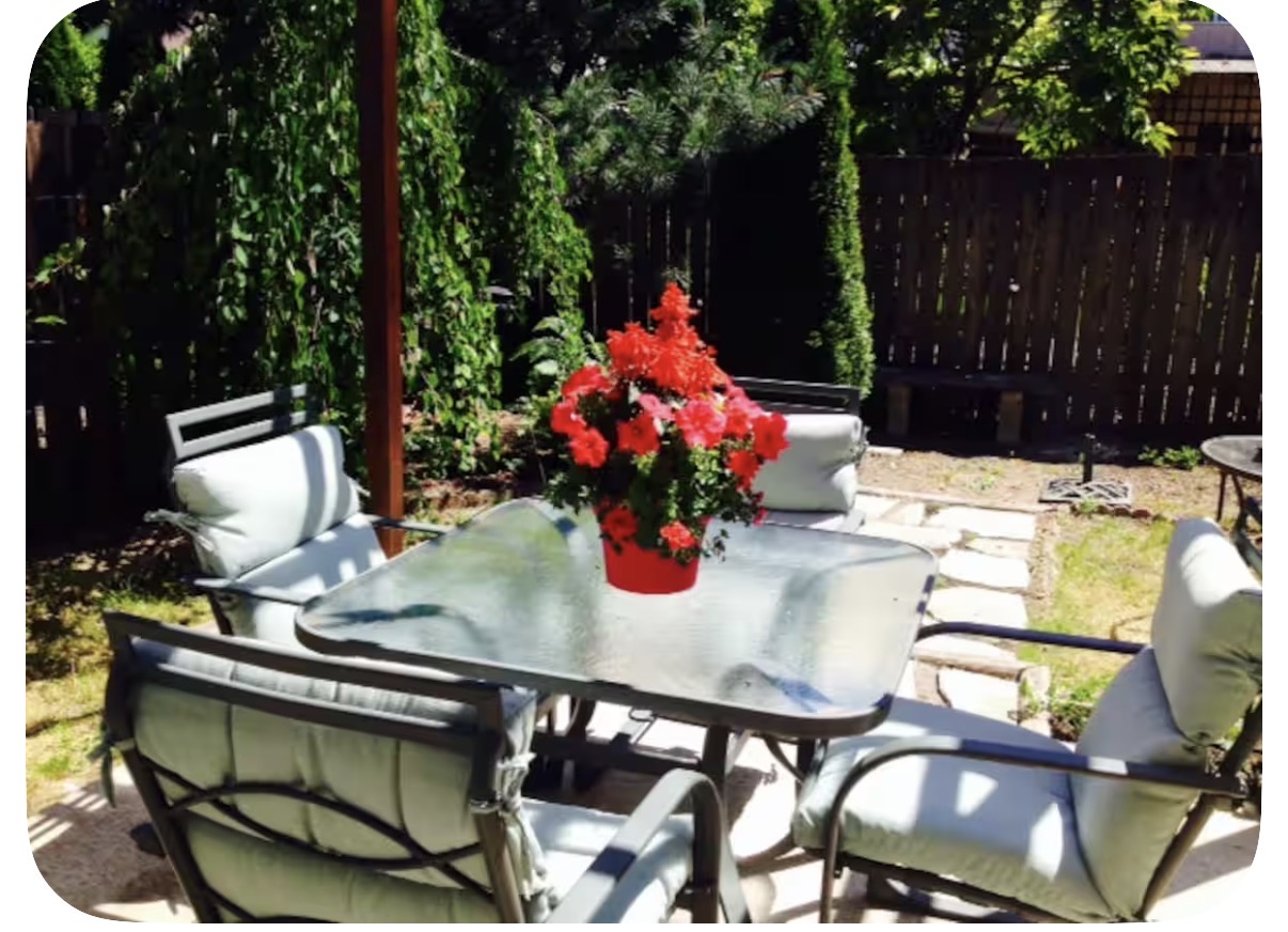 Evening patio table with red rose centerpiece